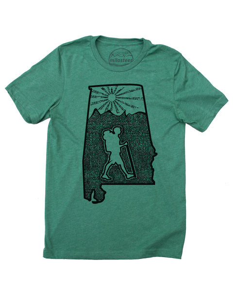 Hike Alabama design with a hiker a setting sun and rolling hills infill the Magnolia State. Original graphic hand screen printed on a soft cotton, polyester blend in a green hue. $21.99, free shipping in the USA. Elevate the day!