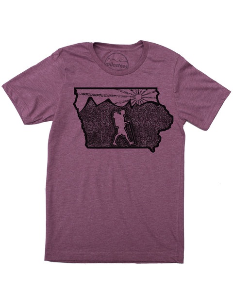 Iowa home shirt with original illustration of a hiker in the middle of the state surrounded by rolling hills and a setting sun. Cotton, polyester blend by Bella + Canvas in a plum hue. Print is black ink. $21.99, free shipping in USA. 