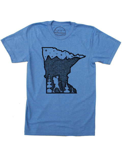 Hike MN screen print, graphic with hiker along bottom of state outline surrounded by trees. Mountains infill the top 3/4 down (mtns made with tiny dots) , satrs and the North Star in top 1/4 of design. Color blue, soft cotton, polyester blend 50/50 by American Apparel. $21.99, free shipping in USA.   