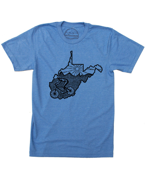Heather Blue T-shirt with mountain biker rolling across WV, the top of the state is infilled with our mountain logo and a setting sun. Sizes s-xxl. 